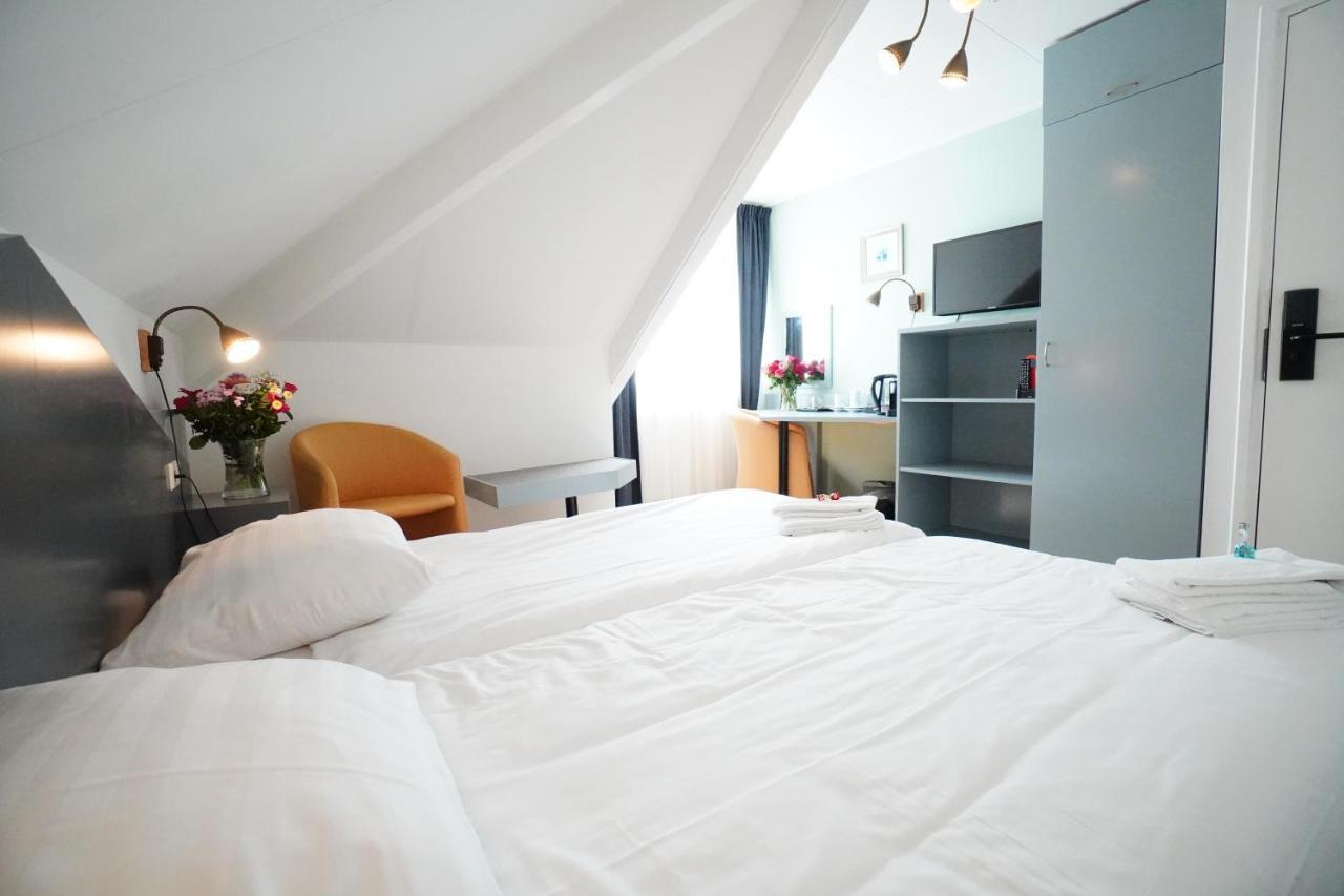 Hotel Den Burg Rum bild